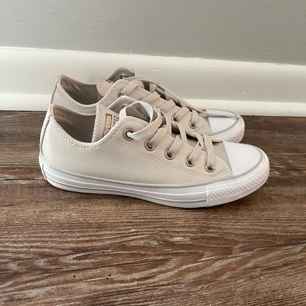 Light tan leather converse